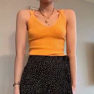 Cute orange top.